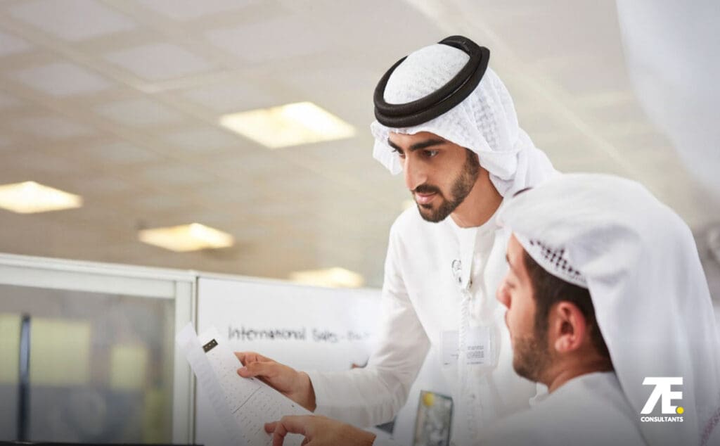 Business professionals discussingCorporate Bank Account in the UAE with 7E Consultants